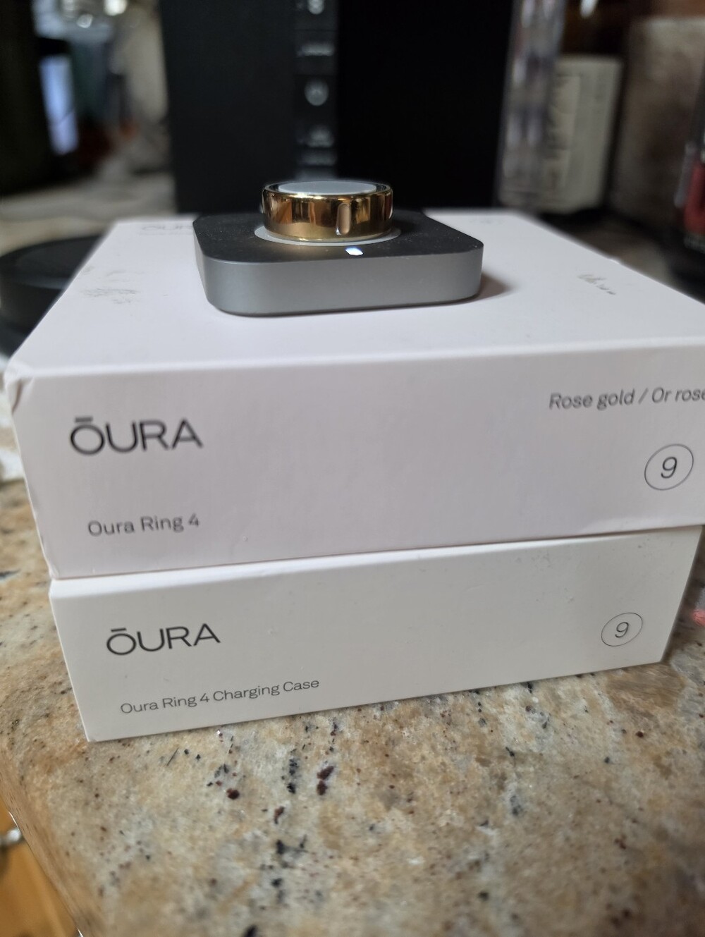 OURA Ring 4 in Rose Gold (Size 9) with portable charging case and extras!